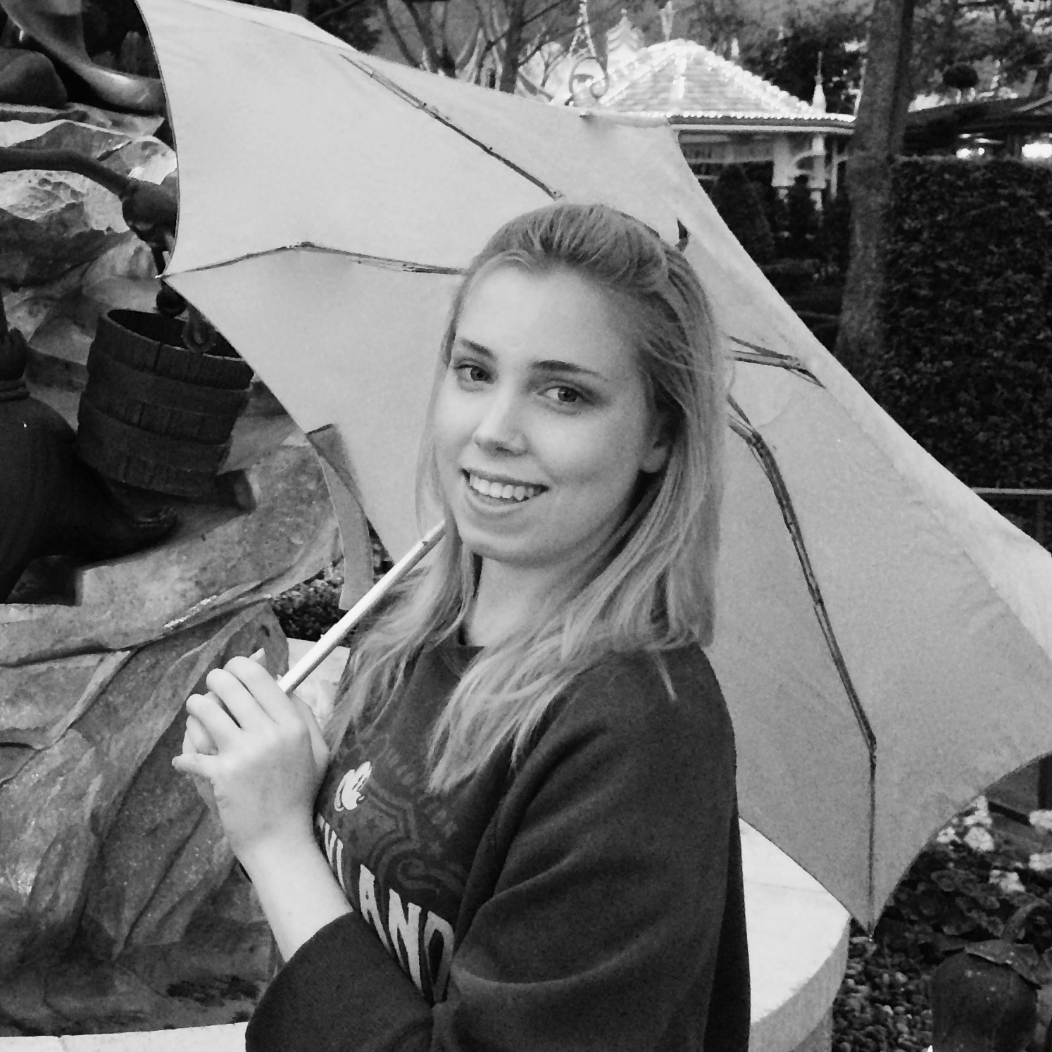 Alanna Mondon under an umbrella